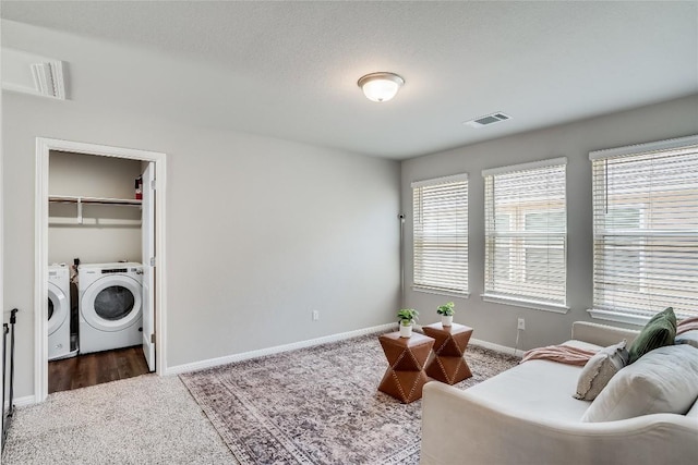 970 Lone Peak Way, Dripping Springs, TX 78620 - sitting room featuring washer and clothes dryer, carpet floors, plenty of natural light, and baseboards