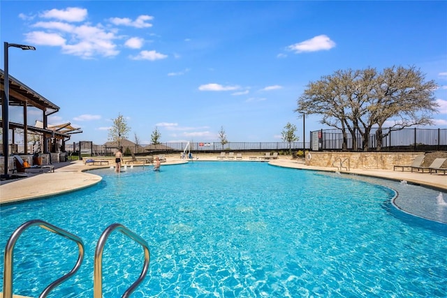 970 Lone Peak Way, Dripping Springs, TX 78620 - community pool featuring a patio