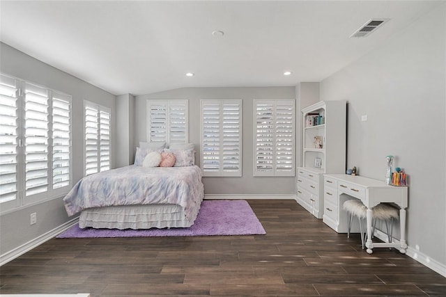 bedroom featuring vaulted ceiling, wood finished floors, baseboards, visible vents, and recessed lighting