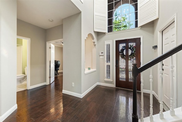 1406 Hunter Ace Way, Cedar Park, TX 78613 - entryway featuring wood finished floors, baseboards, and stairway