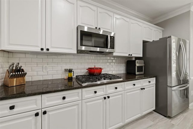 1406 Hunter Ace Way, Cedar Park, TX 78613 - kitchen with stainless steel appliances, crown molding, white cabinetry, dark stone countertops, and tasteful backsplash