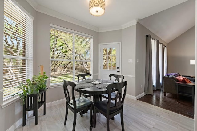 1406 Hunter Ace Way, Cedar Park, TX 78613 - dining space featuring baseboards, crown molding, and light wood finished floors