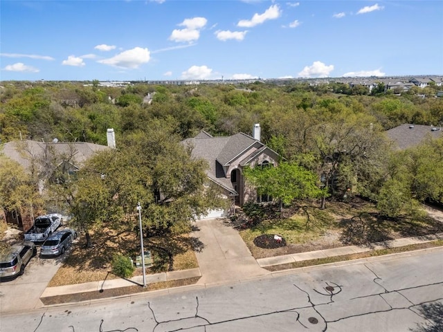 1406 Hunter Ace Way, Cedar Park, TX 78613 - view from above of property featuring a heavily wooded area
