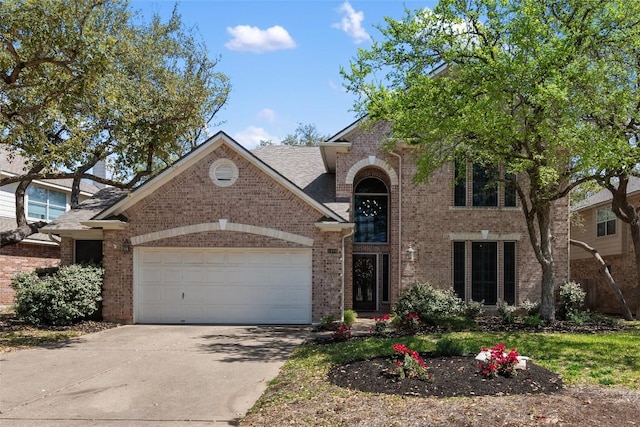 1406 Hunter Ace Way, Cedar Park, TX 78613 - traditional home with brick siding, driveway, and an attached garage