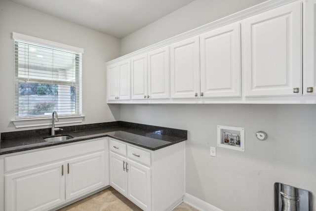 3501 Venezia Vw, Leander, TX 78641 - laundry room with cabinet space, washer hookup, and baseboards