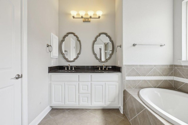 3501 Venezia Vw, Leander, TX 78641 - bathroom with a bath, double vanity, and tile patterned floors