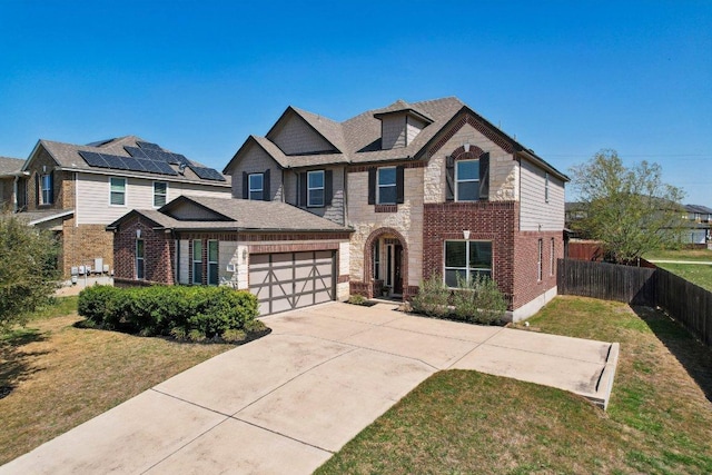 1318 Autumn Sage Way, Pflugerville, TX 78660 - view of front of property with concrete driveway, brick siding, an attached garage, and stone siding