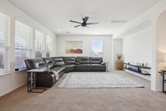 1318 Autumn Sage Way, Pflugerville, TX 78660 - carpeted living area with healthy amount of natural light, ceiling fan, and baseboards