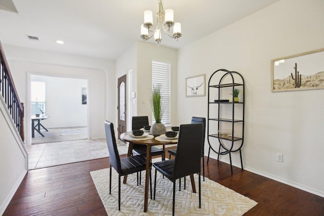 1318 Autumn Sage Way, Pflugerville, TX 78660 - dining space featuring a chandelier, baseboards, recessed lighting, stairway, and wood finished floors