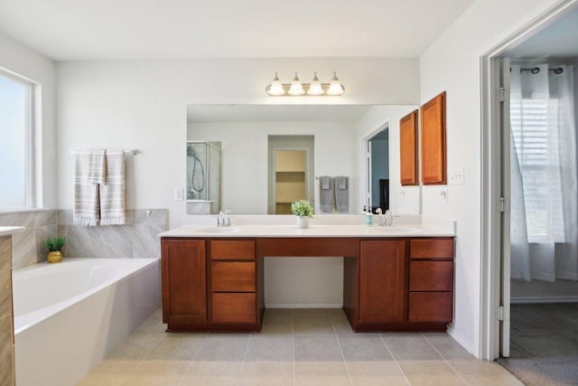 1318 Autumn Sage Way, Pflugerville, TX 78660 - bathroom with double vanity, a bath, tile patterned flooring, and a shower with shower door