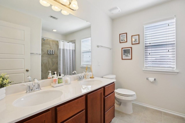 1318 Autumn Sage Way, Pflugerville, TX 78660 - full bath featuring double vanity, a shower with curtain, toilet, baseboards, and tile patterned flooring