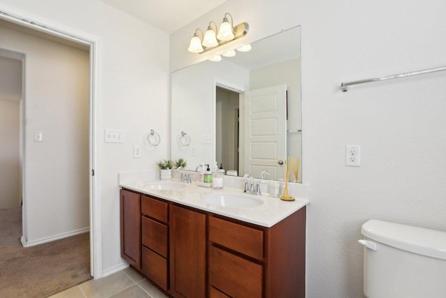 1318 Autumn Sage Way, Pflugerville, TX 78660 - bathroom with double vanity, toilet, and tile patterned flooring