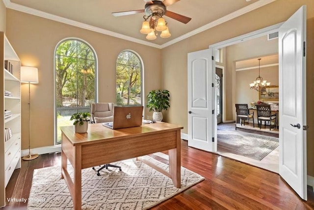 2116 University Club Dr, Austin, TX 78732 - home office featuring ornamental molding, wood finished floors, a ceiling fan, a chandelier, and baseboards