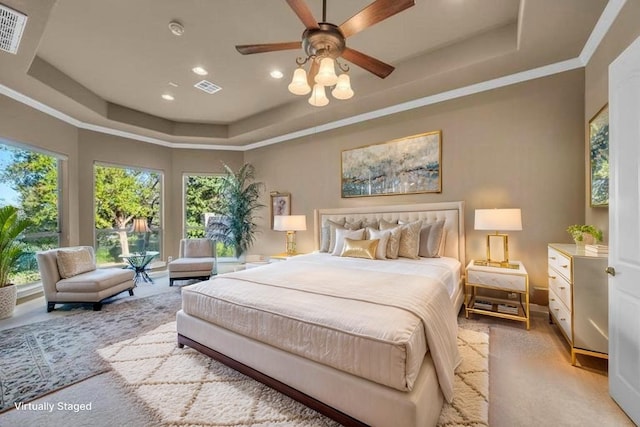 2116 University Club Dr, Austin, TX 78732 - bedroom with a raised ceiling, multiple windows, recessed lighting, and crown molding