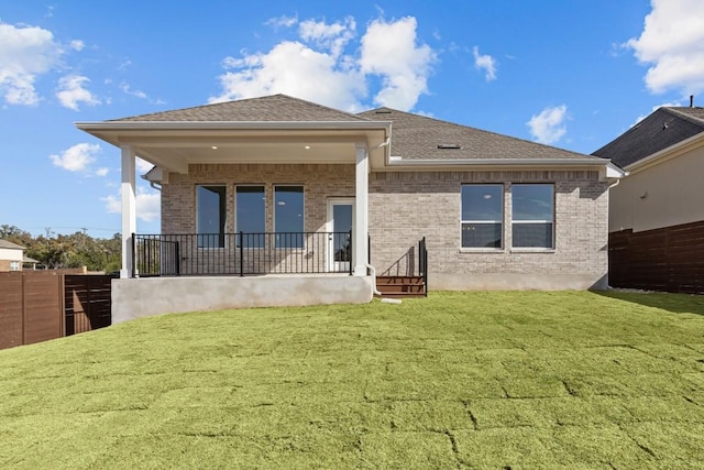 7804 Alouette Dr, Austin, TX 78738 - rear view of house with brick siding and roof with shingles