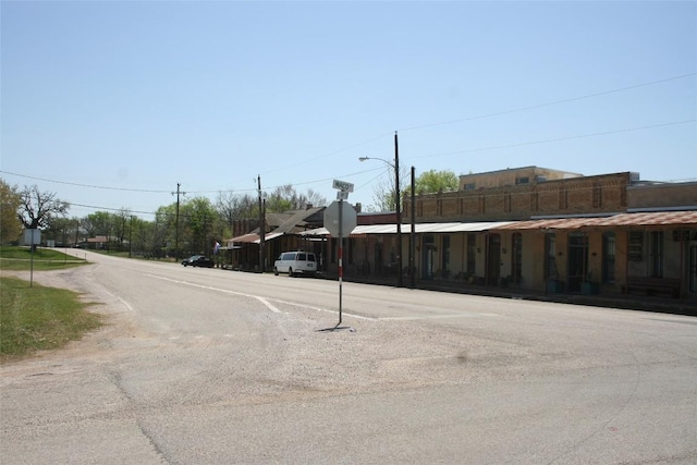 112 Marlin St, Mcdade, TX 78650 - view of road featuring traffic signs and street lighting