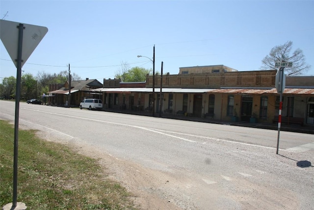 112 Marlin St, Mcdade, TX 78650 - view of road with street lighting and traffic signs