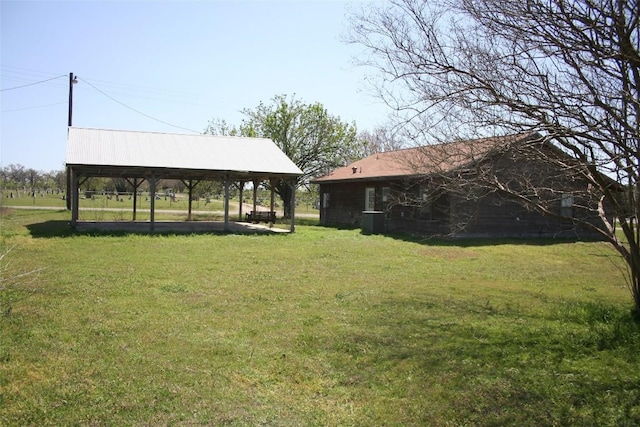 112 Marlin St, Mcdade, TX 78650 - view of yard with a detached carport and a gazebo