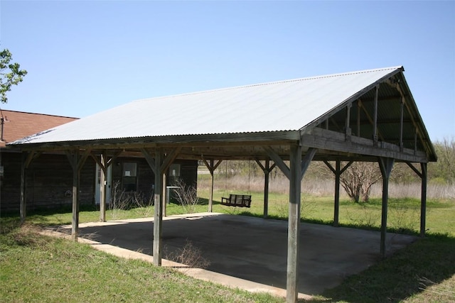 112 Marlin St, Mcdade, TX 78650 - view of parking featuring a detached carport