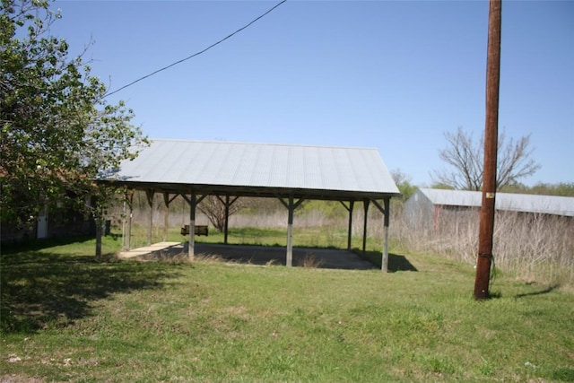 112 Marlin St, Mcdade, TX 78650 - view of yard with a carport