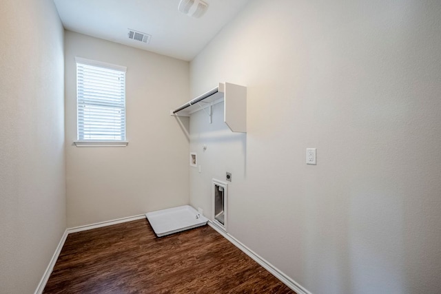 8017 Turnberry Ln, Austin, TX 78744 - laundry room with hookup for an electric dryer, hookup for a washing machine, hookup for a gas dryer, and dark wood-style flooring