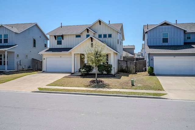 8017 Turnberry Ln, Austin, TX 78744 - view of front of property with board and batten siding, concrete driveway, an attached garage, and roof with shingles