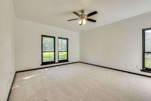 30809 Berry Creek Dr, Georgetown, TX 78628 - carpeted spare room featuring plenty of natural light, ceiling fan, and baseboards
