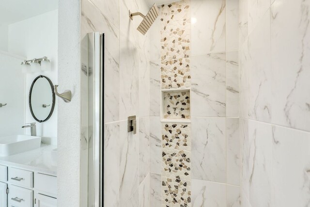 30809 Berry Creek Dr, Georgetown, TX 78628 - bathroom with a marble finish shower and vanity
