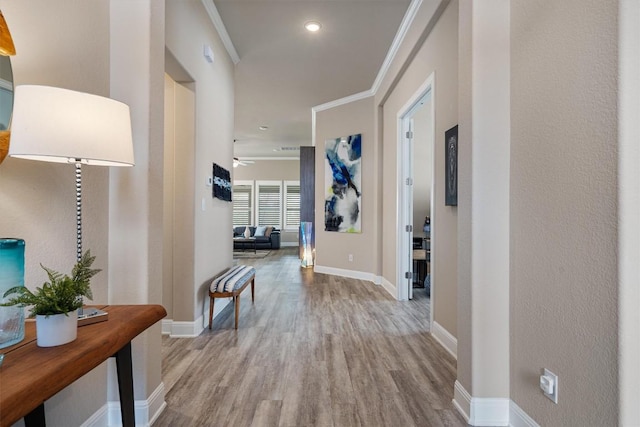 5352 Cornetto Blfs, Round Rock, TX 78665 - corridor featuring wood finished floors, crown molding, and baseboards