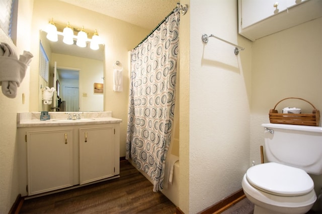 1683 Kuehler Ave, New Braunfels, TX 78130 - full bathroom featuring wood finished floors, vanity, and shower / bath combo