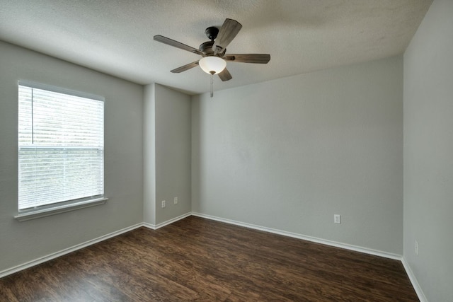 1225 Cardigan St, Cedar Park, TX 78613 - unfurnished room with dark wood-style flooring, healthy amount of natural light, ceiling fan, and a textured ceiling