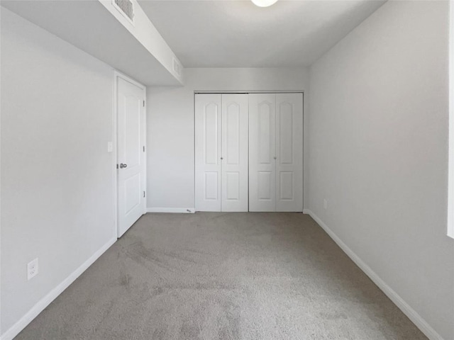1705 Arbor Knot Dr, Kyle, TX 78640 - unfurnished bedroom featuring carpet floors and a closet