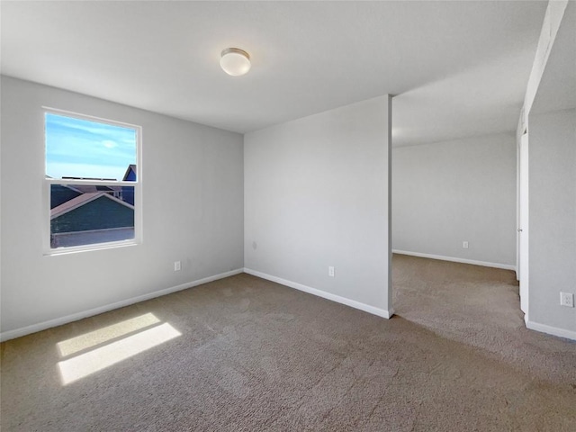 1705 Arbor Knot Dr, Kyle, TX 78640 - carpeted spare room featuring baseboards