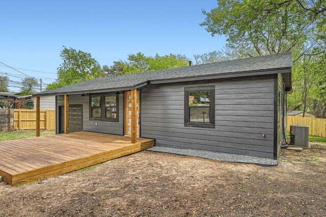 1601 N Redondo Dr, Austin, TX 78721 - rear view of property featuring a deck and a shingled roof