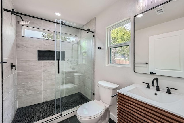 1601 N Redondo Dr, Austin, TX 78721 - bathroom with toilet, vanity, a shower stall, and healthy amount of natural light
