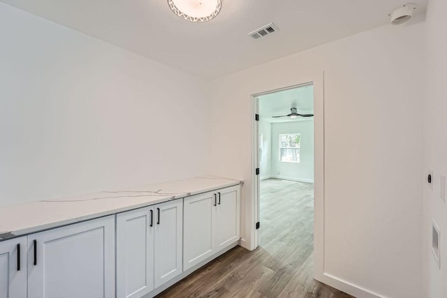 1601 N Redondo Dr, Austin, TX 78721 - hallway featuring light wood-type flooring and baseboards