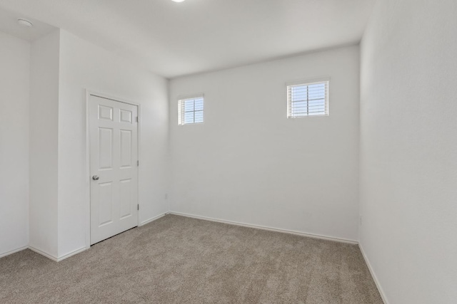 2308 Ringstaff Rd, Leander, TX 78641 - carpeted empty room featuring healthy amount of natural light and baseboards