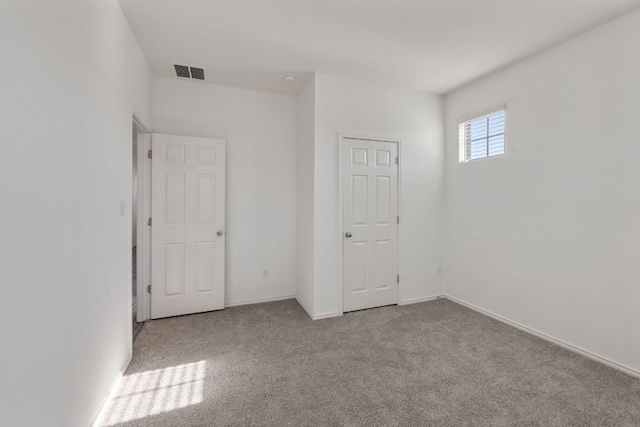 2308 Ringstaff Rd, Leander, TX 78641 - unfurnished bedroom featuring carpet flooring and baseboards