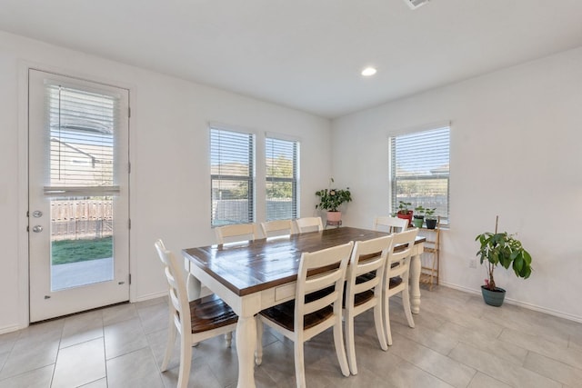 2308 Ringstaff Rd, Leander, TX 78641 - dining area featuring healthy amount of natural light, light tile patterned floors, baseboards, and recessed lighting
