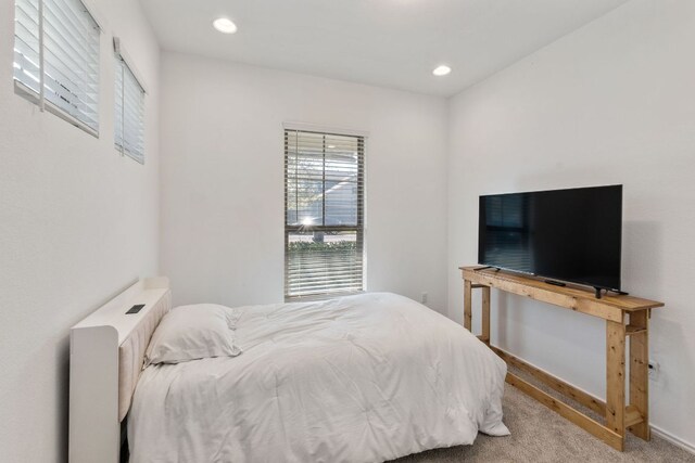 2308 Ringstaff Rd, Leander, TX 78641 - carpeted bedroom with recessed lighting and baseboards