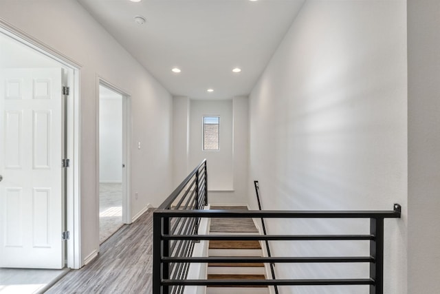 2308 Ringstaff Rd, Leander, TX 78641 - staircase with wood finished floors, recessed lighting, and baseboards
