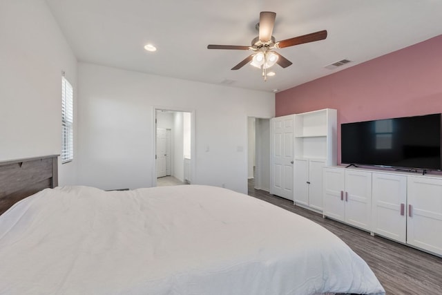 2308 Ringstaff Rd, Leander, TX 78641 - bedroom with dark wood finished floors, ceiling fan, and recessed lighting
