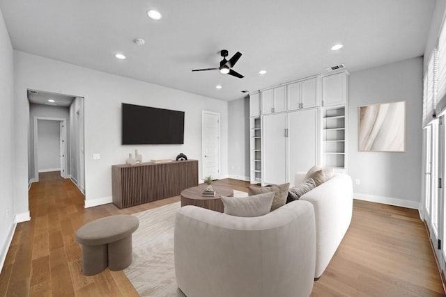 7200 Cordoba Dr, Austin, TX 78724 - living area with ceiling fan, light wood-type flooring, recessed lighting, and built in shelves