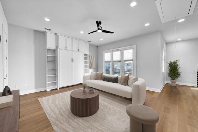 7200 Cordoba Dr, Austin, TX 78724 - living area featuring attic access, baseboards, wood finished floors, ceiling fan, and recessed lighting
