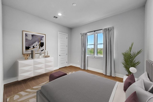 7200 Cordoba Dr, Austin, TX 78724 - bedroom featuring wood finished floors and recessed lighting