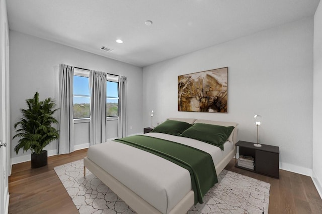 7200 Cordoba Dr, Austin, TX 78724 - bedroom featuring wood finished floors and recessed lighting