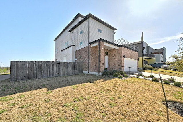7200 Cordoba Dr, Austin, TX 78724 - view of property exterior featuring a garage and brick siding