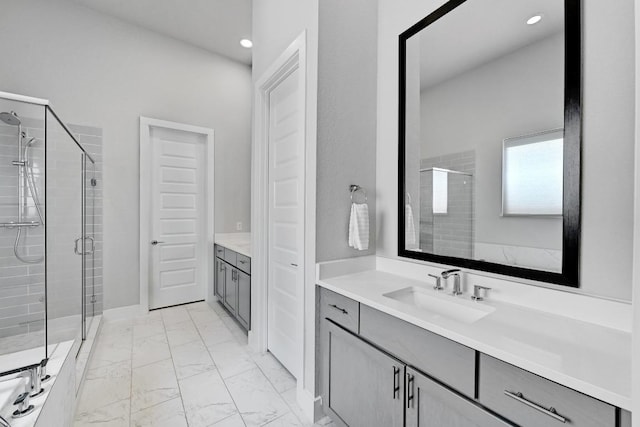 7200 Cordoba Dr, Austin, TX 78724 - full bath featuring vanity, a shower stall, marble finish flooring, and recessed lighting
