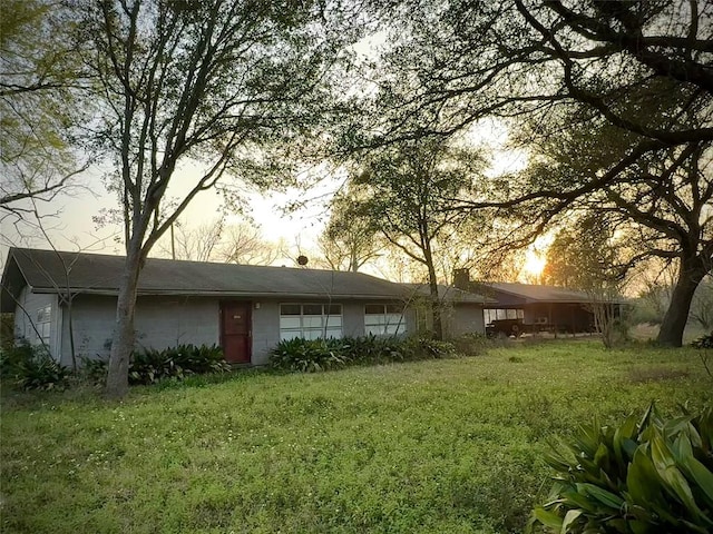 exterior space with a lawn