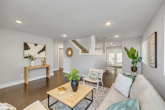 3510 Oak Springs Dr, Austin, TX 78721 - living room featuring wood finished floors, stairway, recessed lighting, and french doors